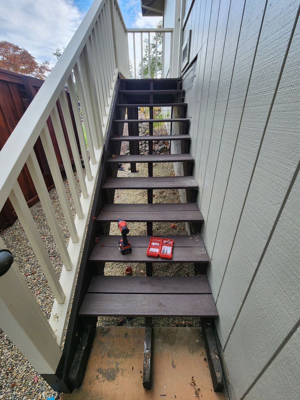 Tools staged on the stair treads before starting the stringer repair in Santa Rosa