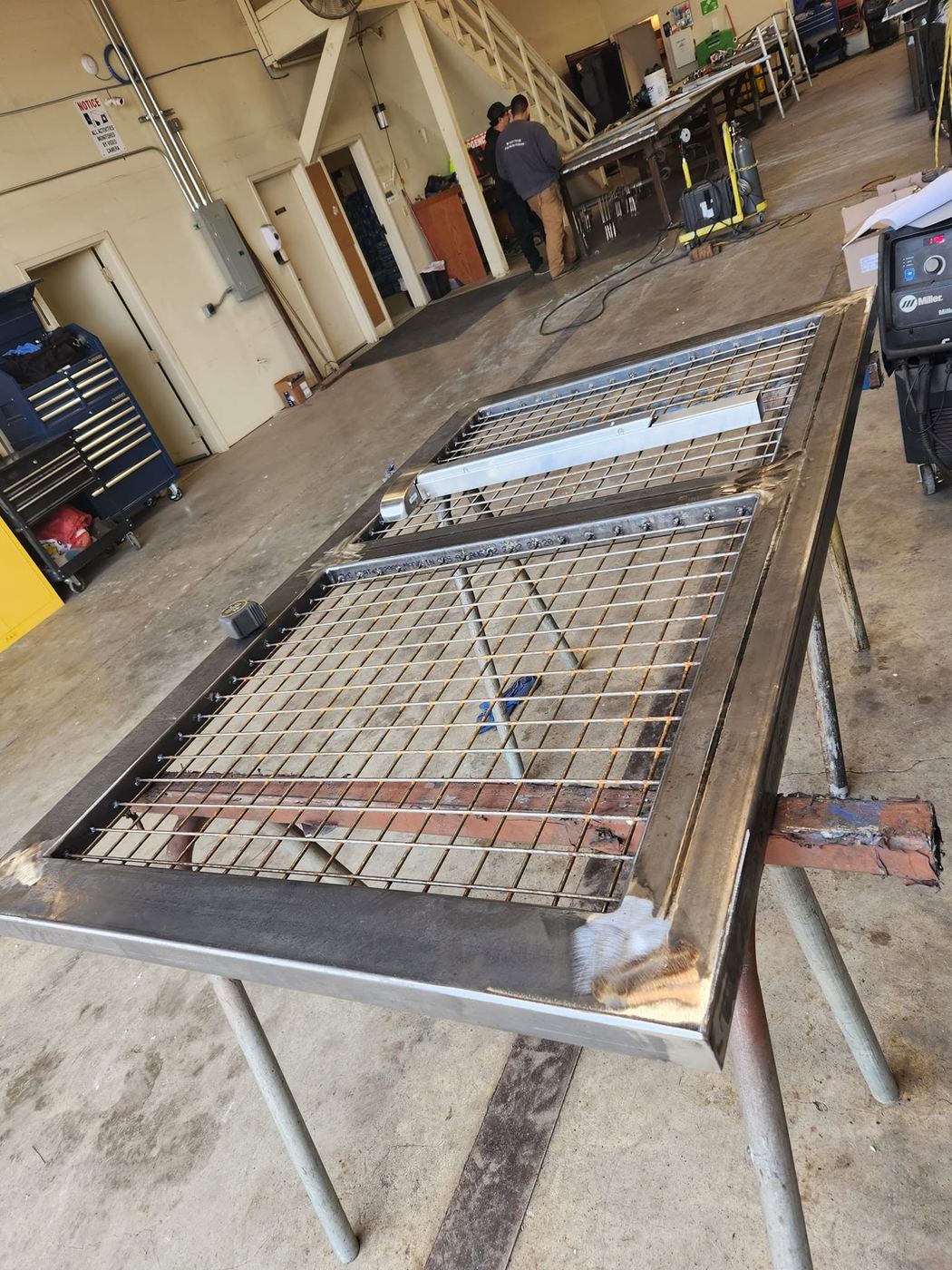 Welded steel mesh gate frames in the shop