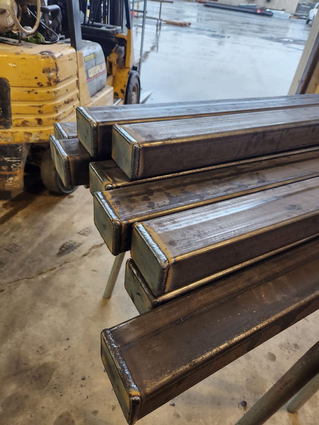 Stacked welded square tubing frame legs